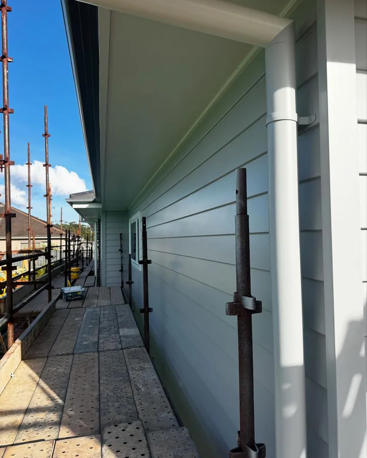 Exterior cladding finished in Surfmist and Shale Grey