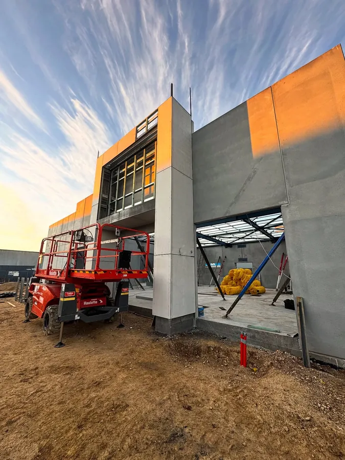 Raw concrete commercial shell under construction