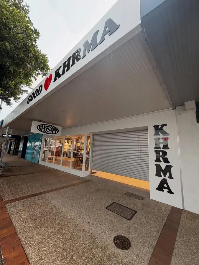 Freshly painted white shopfront on a Port Macquarie street
