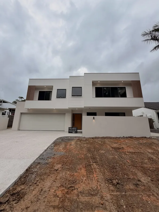 Two-storey new-build home finished in Natural White